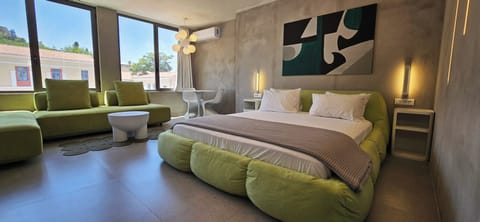 Deluxe Suite, Acropolis View | 1 bedroom, hypo-allergenic bedding, down comforters, pillowtop beds