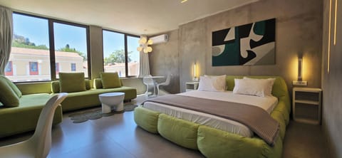 Deluxe Suite, Acropolis View | 1 bedroom, hypo-allergenic bedding, down comforters, pillowtop beds