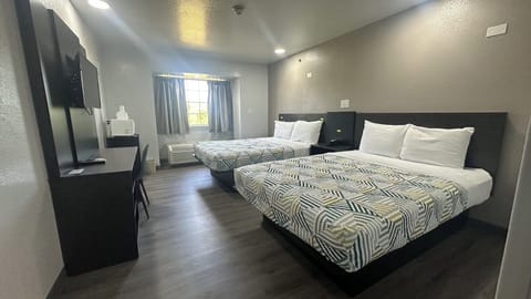 Desk, blackout drapes, WiFi (free), bed sheets