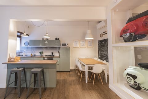 Comfort Apartment, 4 Bedrooms | Private kitchen | Espresso maker, coffee/tea maker, electric kettle, dining tables