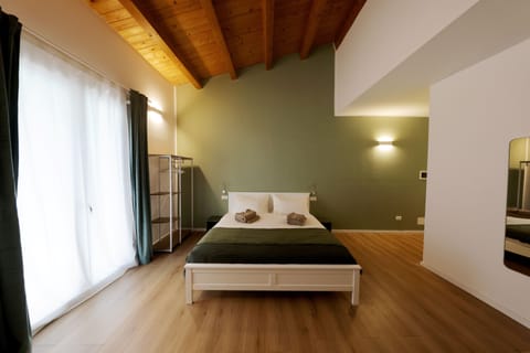 Deluxe Room, 1 King Bed with Sofa bed, City View | Premium bedding, down comforters, memory foam beds, blackout drapes