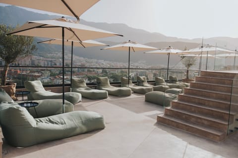 Seasonal outdoor pool, pool umbrellas, sun loungers