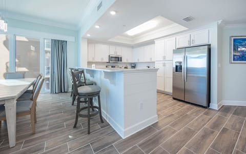 Condo, 4 Bedrooms | Private kitchen | Fridge, oven, coffee/tea maker