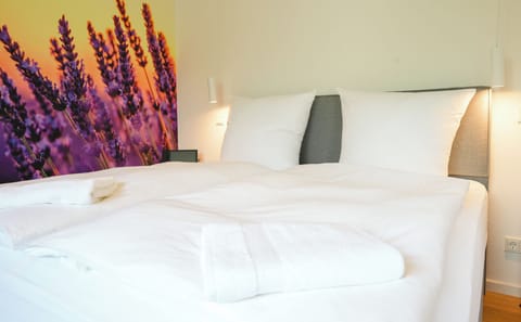 Premium bedding, minibar, in-room safe, individually decorated