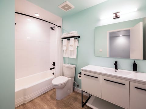 Standard Room, 2 Queen Beds | Bathroom | Hair dryer, towels, soap, shampoo