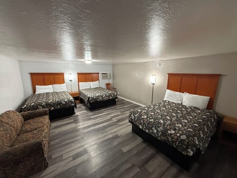 3 Queen Beds with Kitchenette | Premium bedding, down comforters, desk, laptop workspace