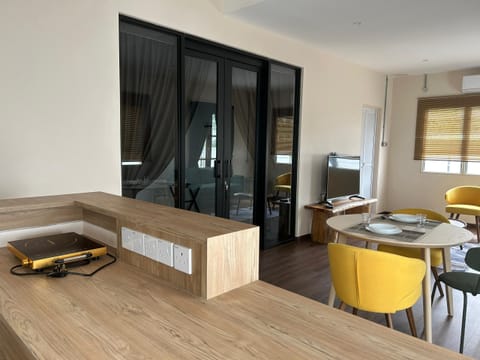 Basic House | Living area | 43-inch flat-screen TV with cable channels