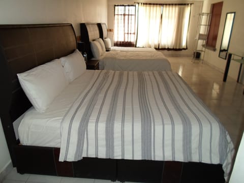 Family Suite, Multiple Beds, Kitchen | Down comforters, free WiFi, bed sheets