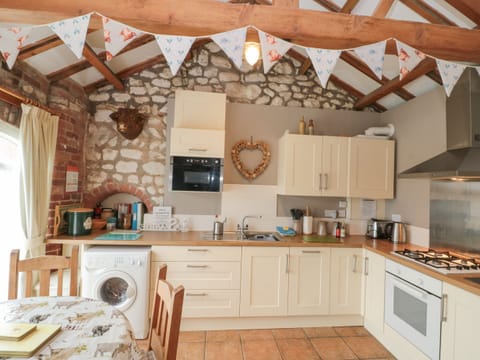 Fridge, electric kettle, toaster, cookware/dishes/utensils