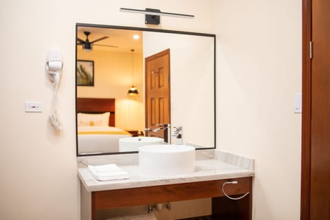 Standard Room, 1 King Bed | In-room safe, individually decorated, blackout drapes, rollaway beds