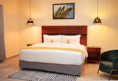 Standard Room, 1 King Bed | In-room safe, individually decorated, blackout drapes, rollaway beds