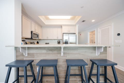 Condo, 2 Bedrooms | Private kitchen | Fridge, oven, coffee/tea maker