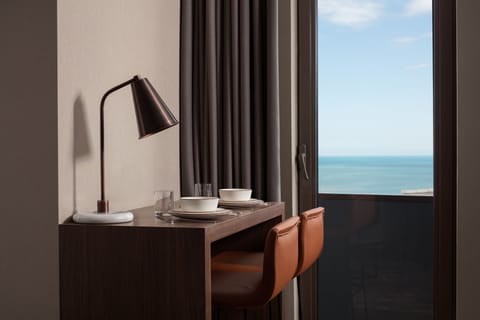 Premium bedding, down comforters, minibar, in-room safe