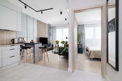 Luxury Suite | Living area | Flat-screen TV