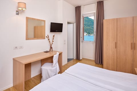 Panoramic Triple Room, Lake View | Premium bedding, down comforters, in-room safe, desk