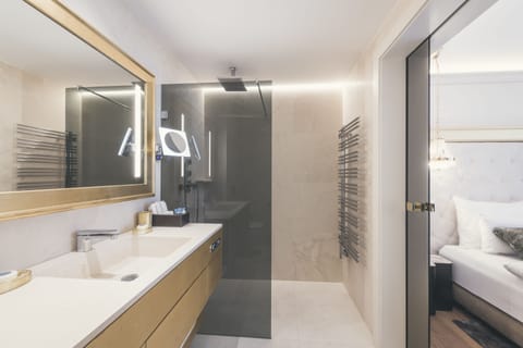 Superior Apartment | Bathroom | Designer toiletries, hair dryer, bathrobes, slippers