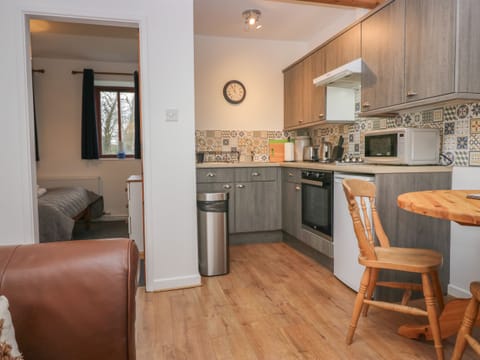 Fridge, electric kettle, toaster, cookware/dishes/utensils