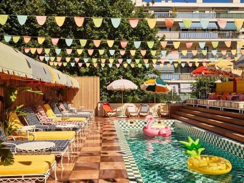 Outdoor pool, open 9:00 AM to 9:00 PM, free cabanas, pool umbrellas