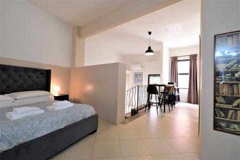 City Apartment | Desk, blackout drapes, soundproofing, iron/ironing board