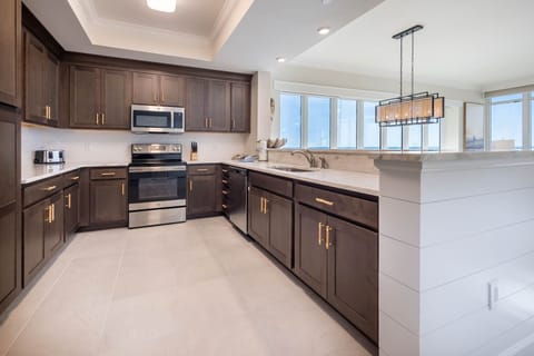 Condo, 4 Bedrooms | Private kitchen | Fridge, oven, coffee/tea maker