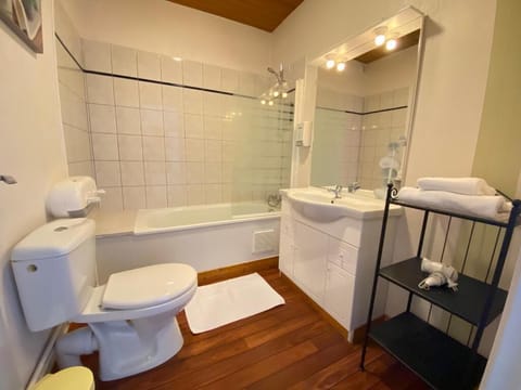 Bathtub, hair dryer, towels