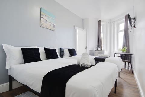 Premium Triple Room, City View | Premium bedding, down comforters, memory foam beds, desk