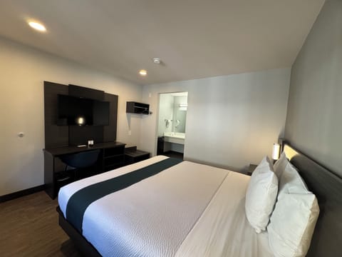 Deluxe Room, 1 King Bed, Non Smoking, Refrigerator | Free WiFi, bed sheets