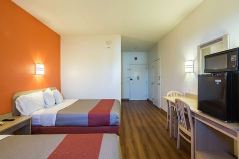 Desk, free WiFi, bed sheets, alarm clocks