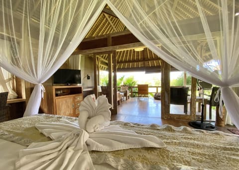 Private Wooden Bungalow | Minibar, in-room safe, desk, bed sheets