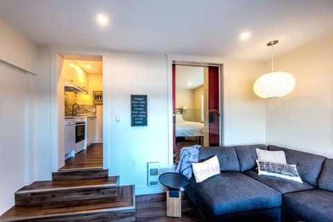 Suite, 1 Bedroom, Ocean View | Living area | 50-inch Smart TV with cable channels