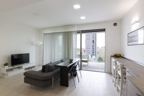 Panoramic Apartment | Living area | 43-inch Smart TV with digital channels