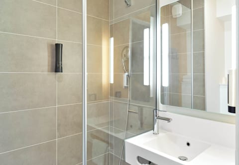 Shower, towels, soap, toilet paper