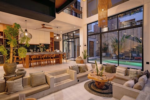 Villa | Living area | 60-inch flat-screen TV with cable channels