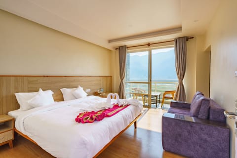 Premium bedding, desk, laptop workspace, soundproofing