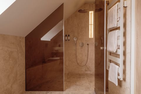 Suite, Lake View | Bathroom | Hair dryer, bathrobes, towels, soap