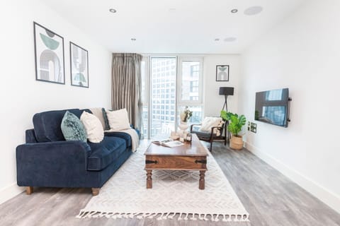 City Apartment | Living area | 40-inch Smart TV with satellite channels