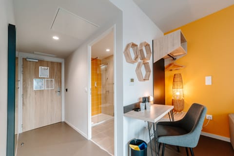 Family Room | Desk, laptop workspace, blackout drapes, iron/ironing board