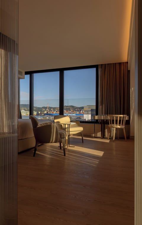 Junior Suite, Partial Sea View | Premium bedding, down comforters, pillowtop beds, free minibar