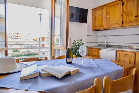 Apartment | Living area | 24-inch flat-screen TV with satellite channels