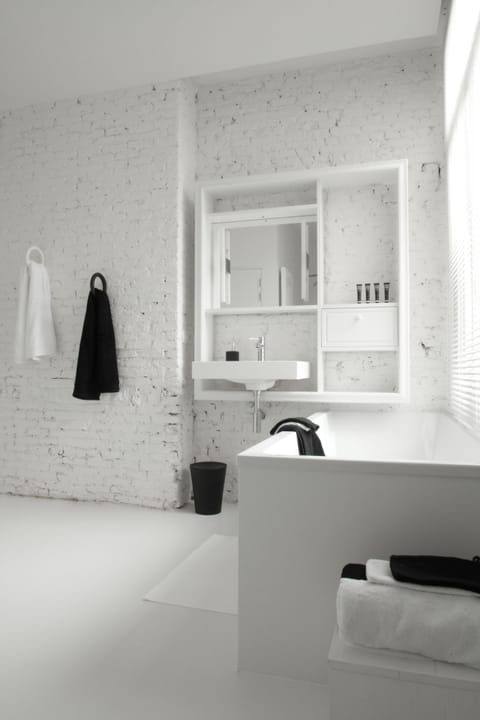 Separate tub and shower, deep soaking tub, eco-friendly toiletries