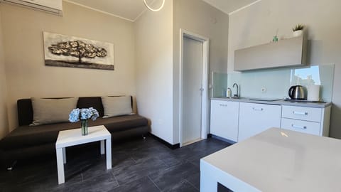 Standard Apartment, 1 Bedroom | Living area | LCD TV