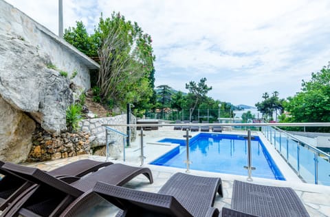 Outdoor pool, sun loungers