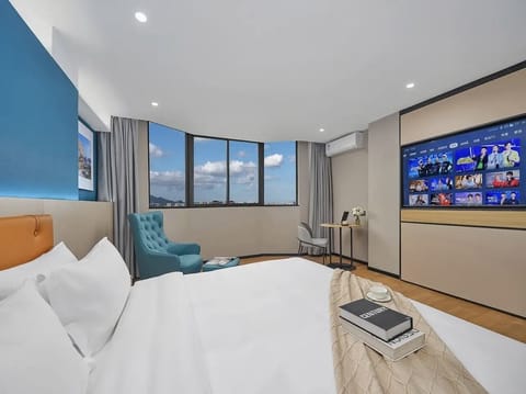 Deluxe Room | Desk, blackout drapes, iron/ironing board, free WiFi