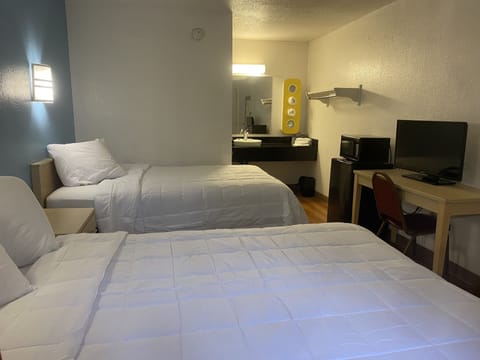 Desk, free WiFi, bed sheets