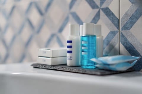 Shower, free toiletries, hair dryer, bathrobes