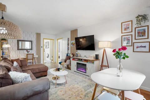 Deluxe Apartment, 2 Bedrooms, Private Bathroom, Beachside | Living area | 55-inch flat-screen TV with digital channels