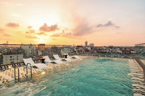 Outdoor pool, open 8:00 AM to 10:00 PM, pool umbrellas, sun loungers