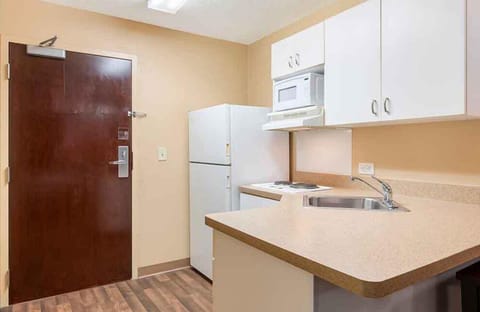 Studio Suite, 1 Queen Bed, Non Smoking | Private kitchen | Full-size fridge, microwave, stovetop, coffee/tea maker