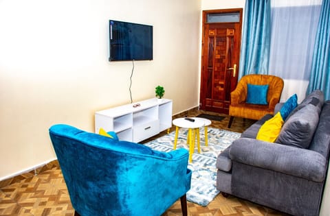 City Apartment | Living area | 24-inch Smart TV with digital channels