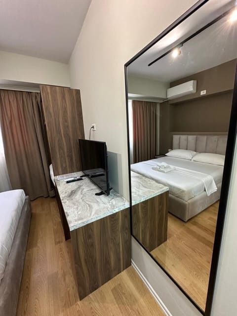 Deluxe Double Room, Garden View | Desk, laptop workspace, blackout drapes, soundproofing